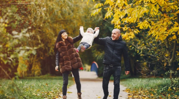 toddler playing with parents