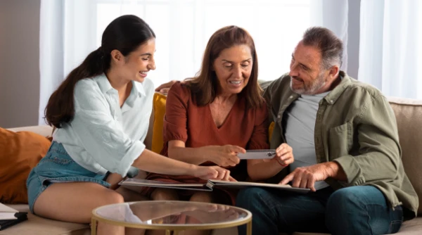 elderly couple with their child