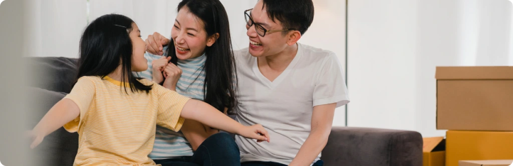 a happy family of three